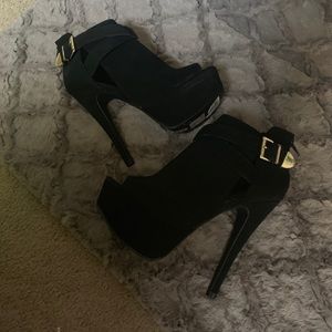 Bootie like,open toed heels.